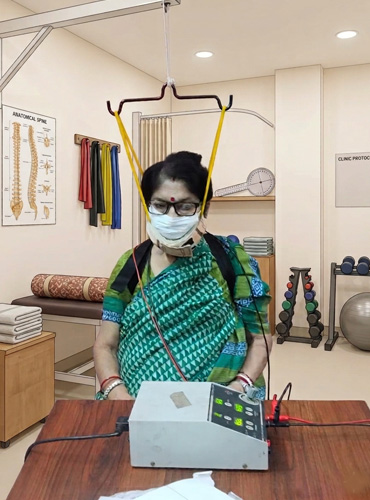 Cervical Traction with TENS Therapy